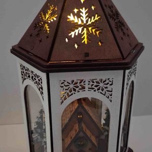 Lanterne avec église à l'intérieur