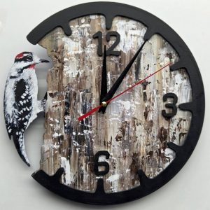 Horloge motif pic-bois